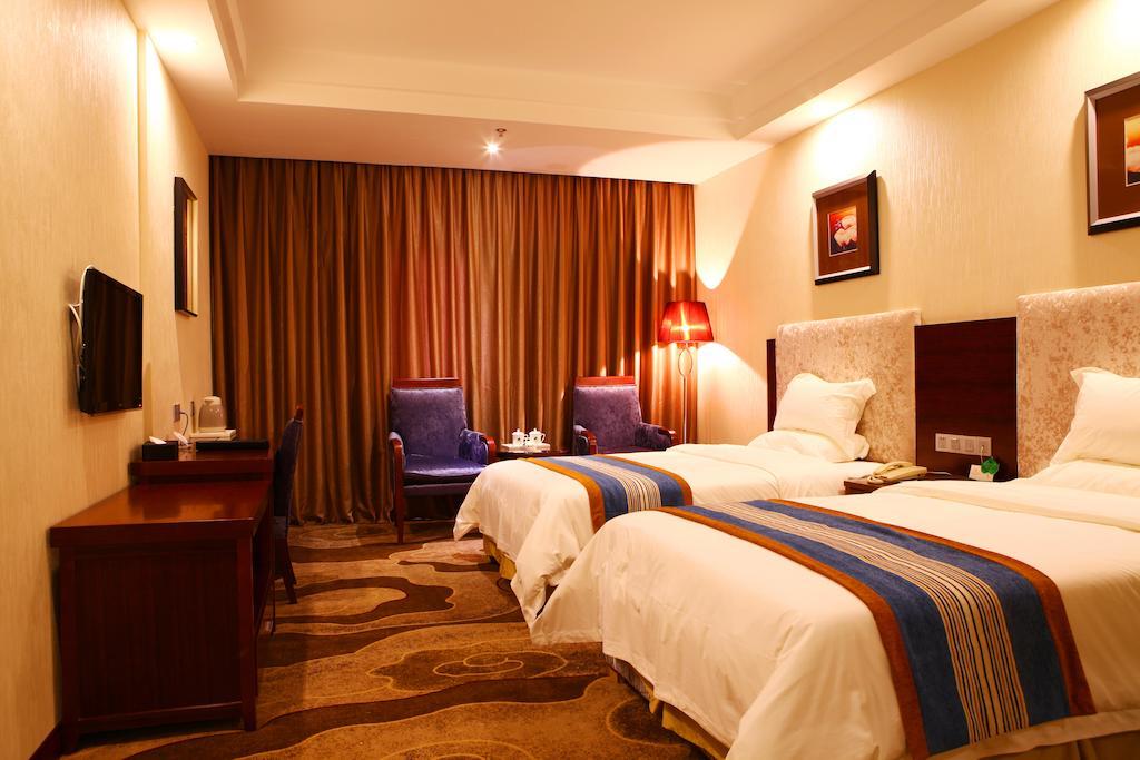 Mingcheng Times Hotel Çengdu Oda fotoğraf