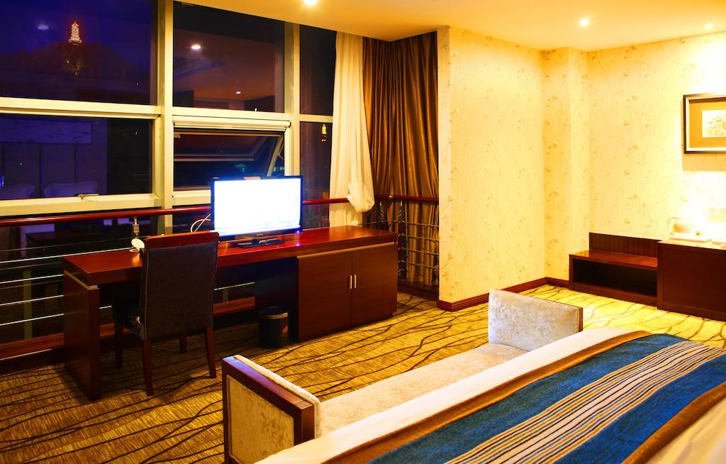 Mingcheng Times Hotel Çengdu Oda fotoğraf