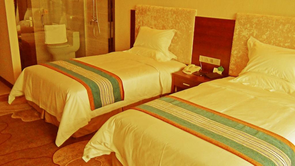 Mingcheng Times Hotel Çengdu Oda fotoğraf